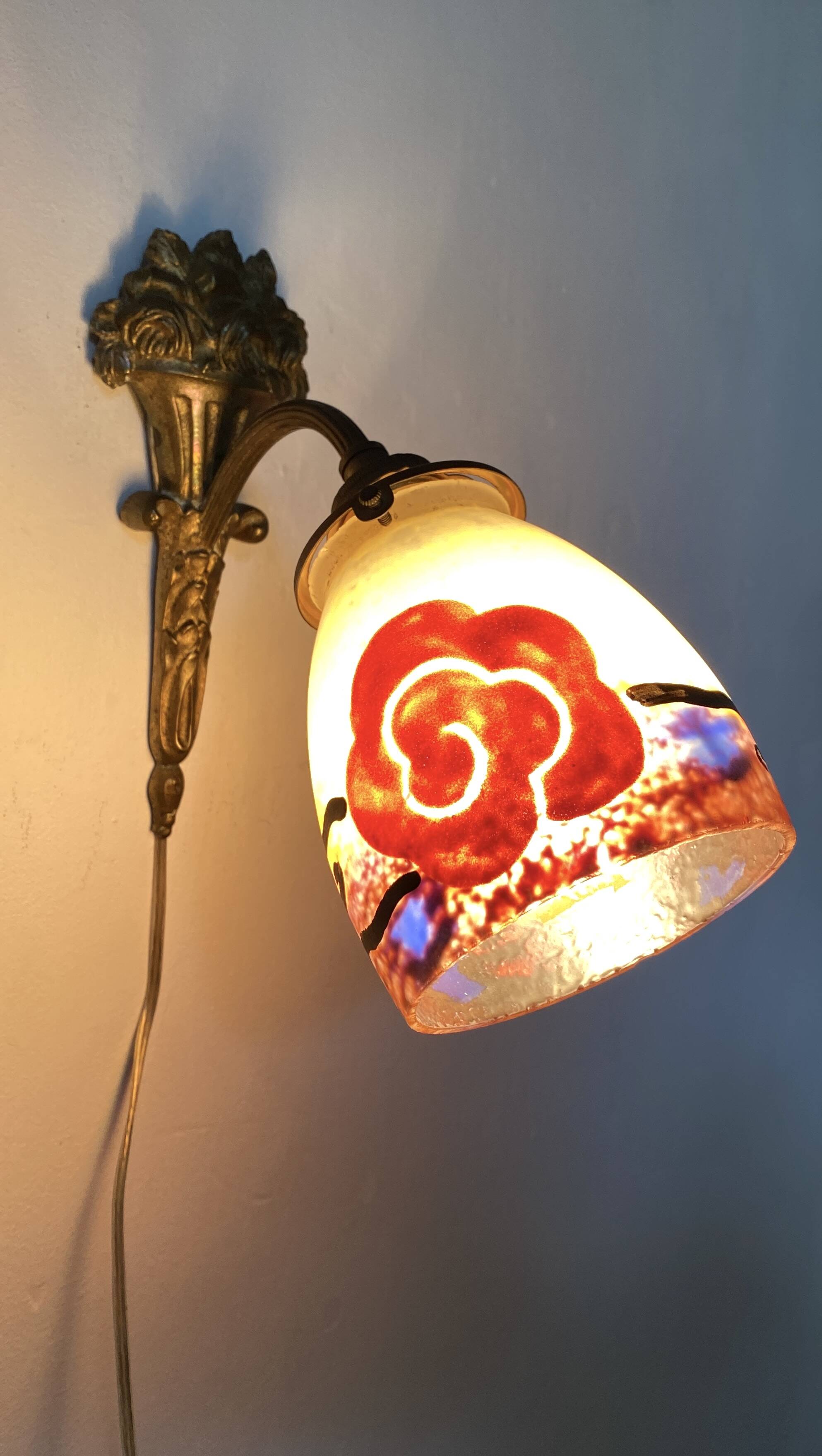 Antique bronze and glass paste wall light