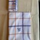 Embroidered checkered tablecloth with its 6 embroidered napkins