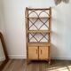 Bookcase shelf in braided wicker, bamboo and rattan