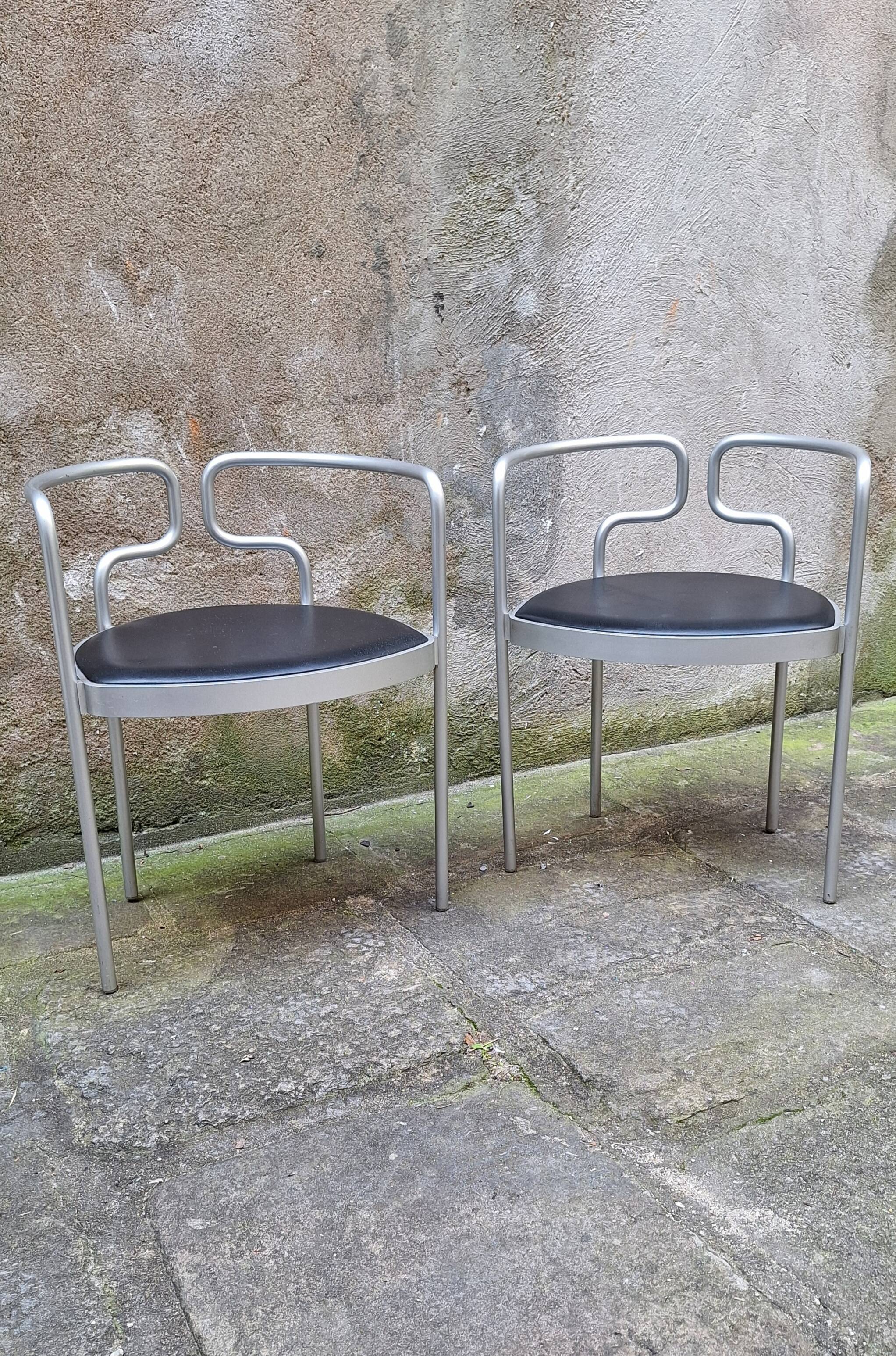 Pair of aluminum armchairs by Henning Larsen