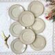8 Small plates in speckled stoneware Tulowice mid century 20th