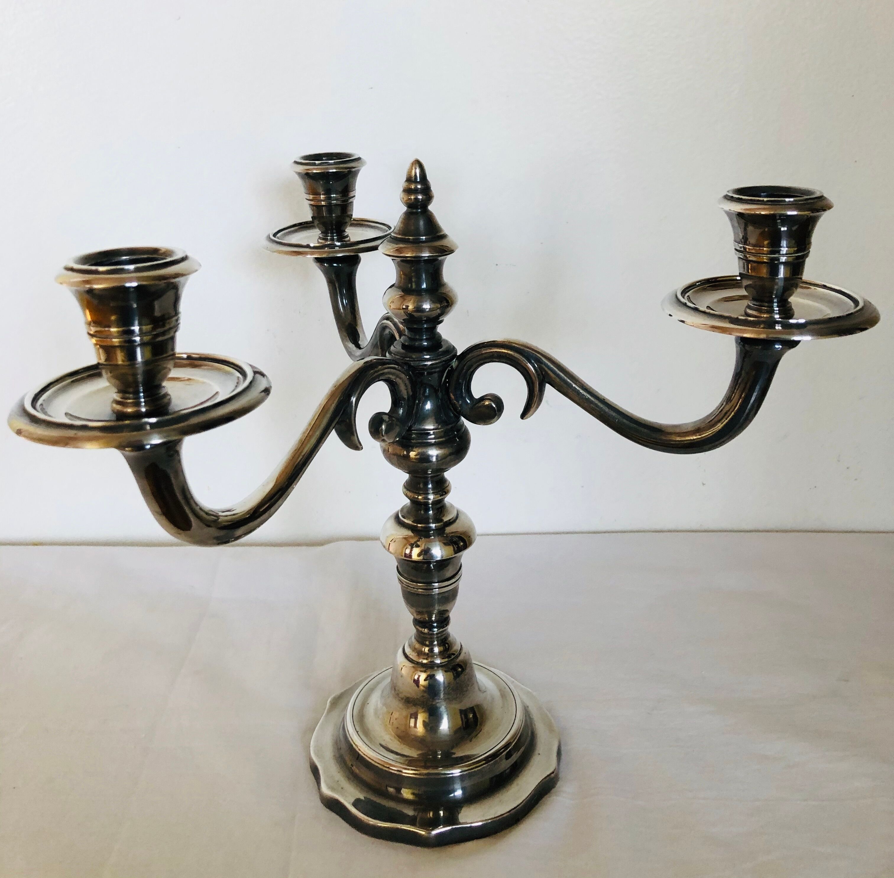 Pair of silver metal candlesticks