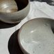 A small speckled grey stoneware bowl D13.5 H8