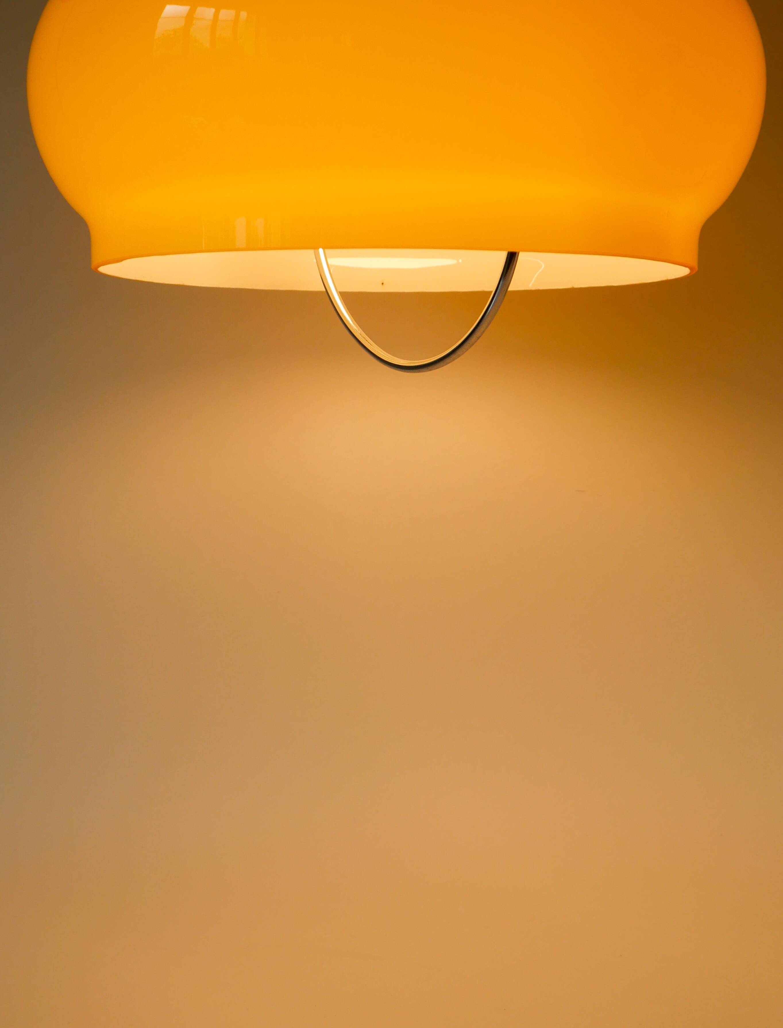 Yellow opaline pendant light with metal arc, Design, 1970