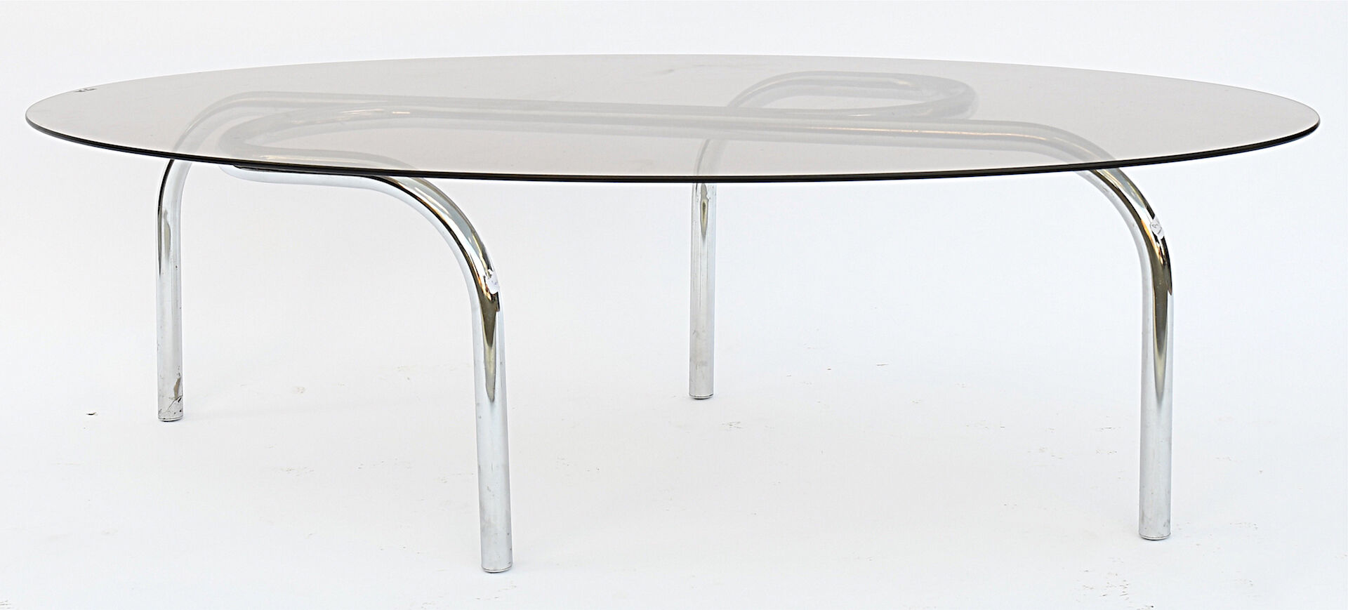 Coffee table in chromed metal and glass