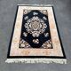 Superb vintage Chinese rug in black wool. Beijing, circa 1950
