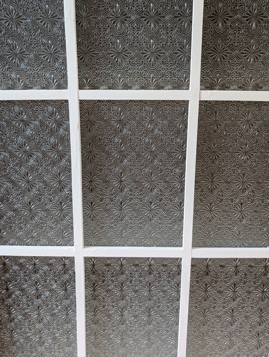 Renovated glass Parisian bonnet maker