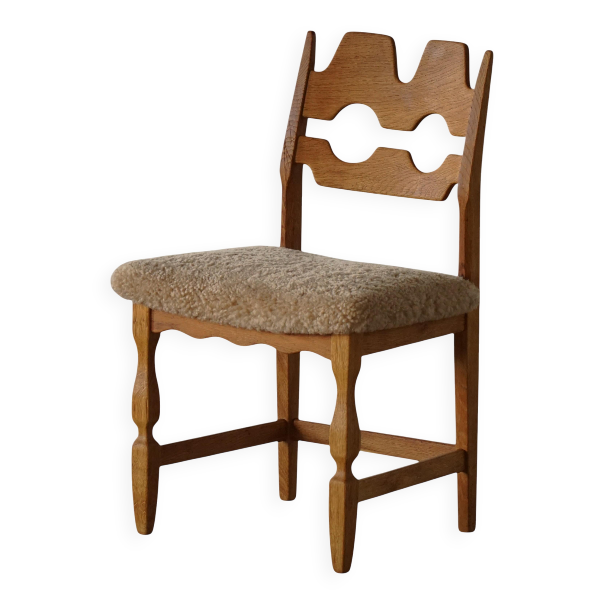 "Razorblade" dining chair by Henning Kjærnulf, in oak and lamb's wool, Denmark, 1960s.