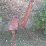 Brutalist tripod chair of conquistadors in fir and leather