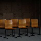 Set of 6 industrial stackable chairs by Niels Larsen, black metal and oak, 1960s.