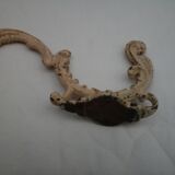 Chiseled cast iron patère