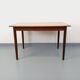 Rectangular dining table in vintage Scandinavian style made of teak and melamine.
