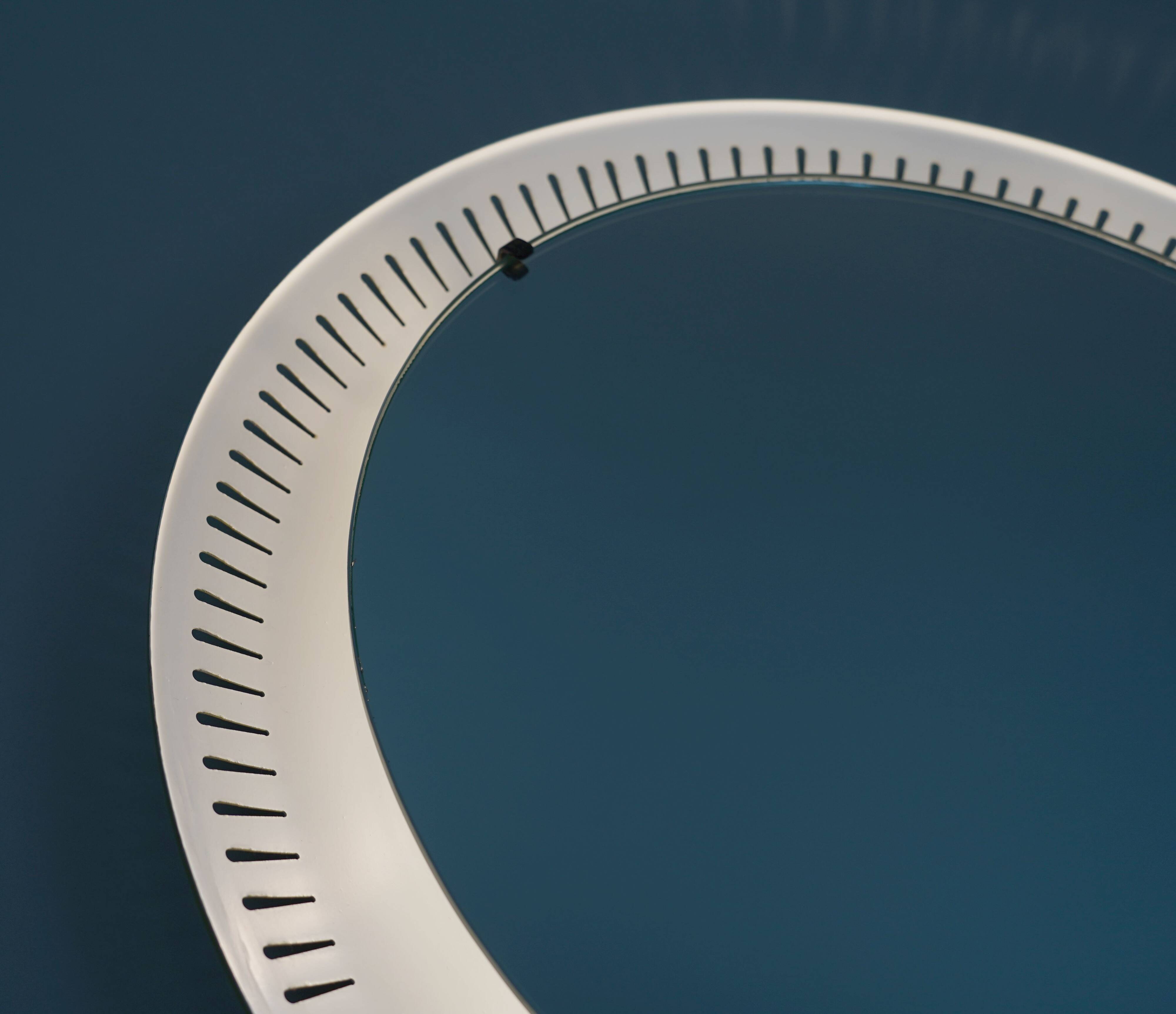 round mid century modern illuminated WALL MIRROR with metal frame 1950s