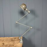 Dark grey Jielde three-arm clamp table lamp