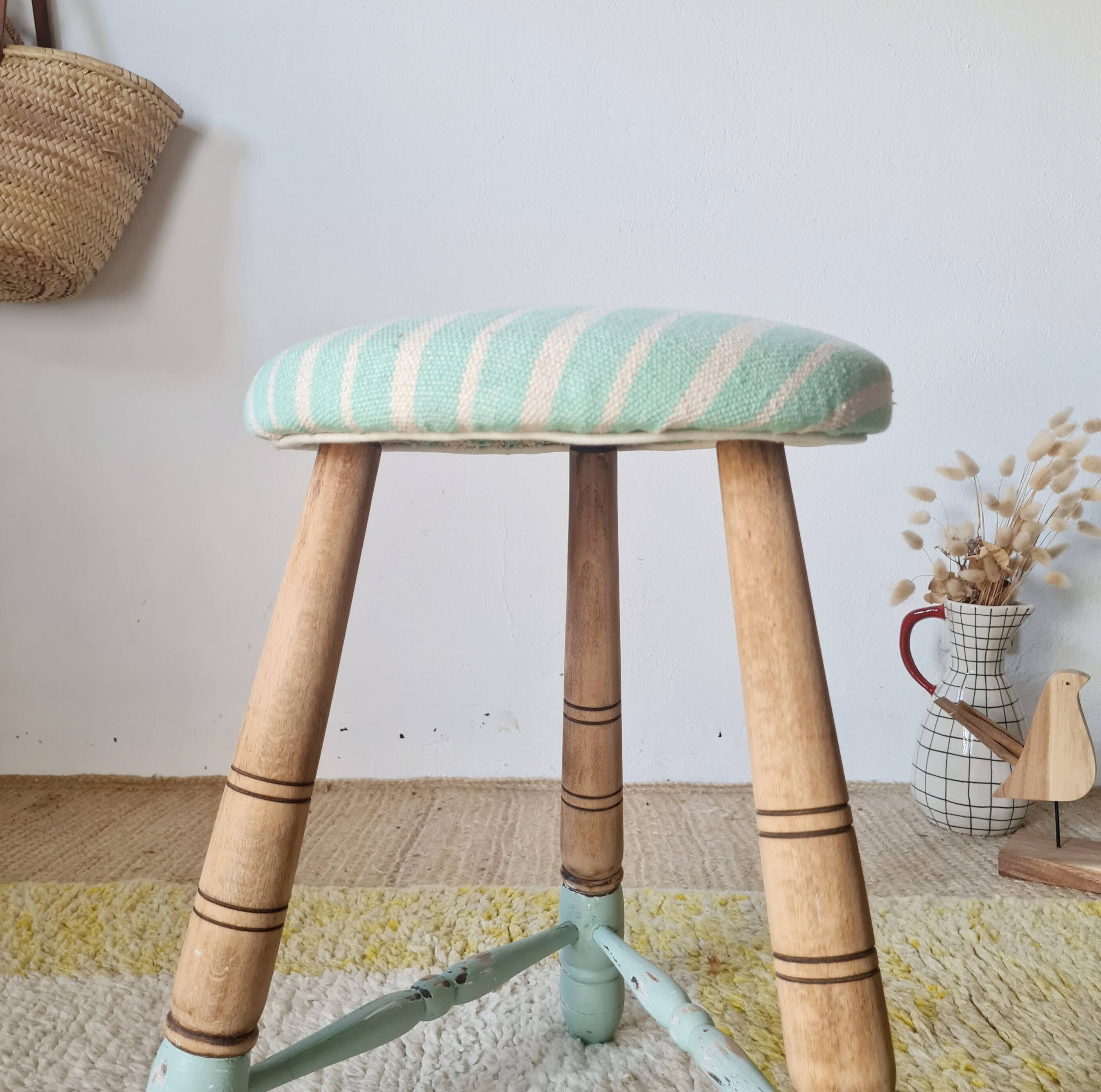 Antique tripod stool with striped seat