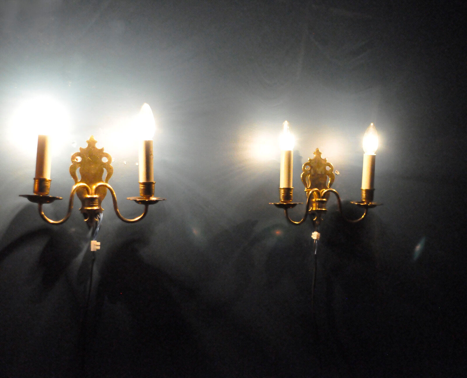 Pair of brass wall sconces by Schroder & Co