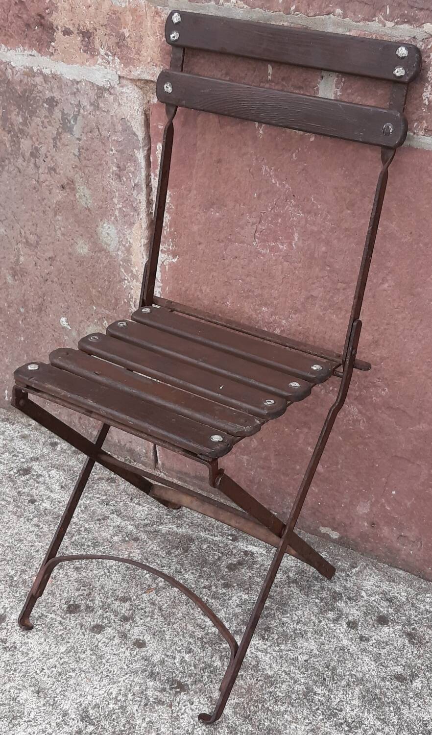 Foldable wrought iron chair