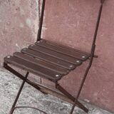 Foldable wrought iron chair