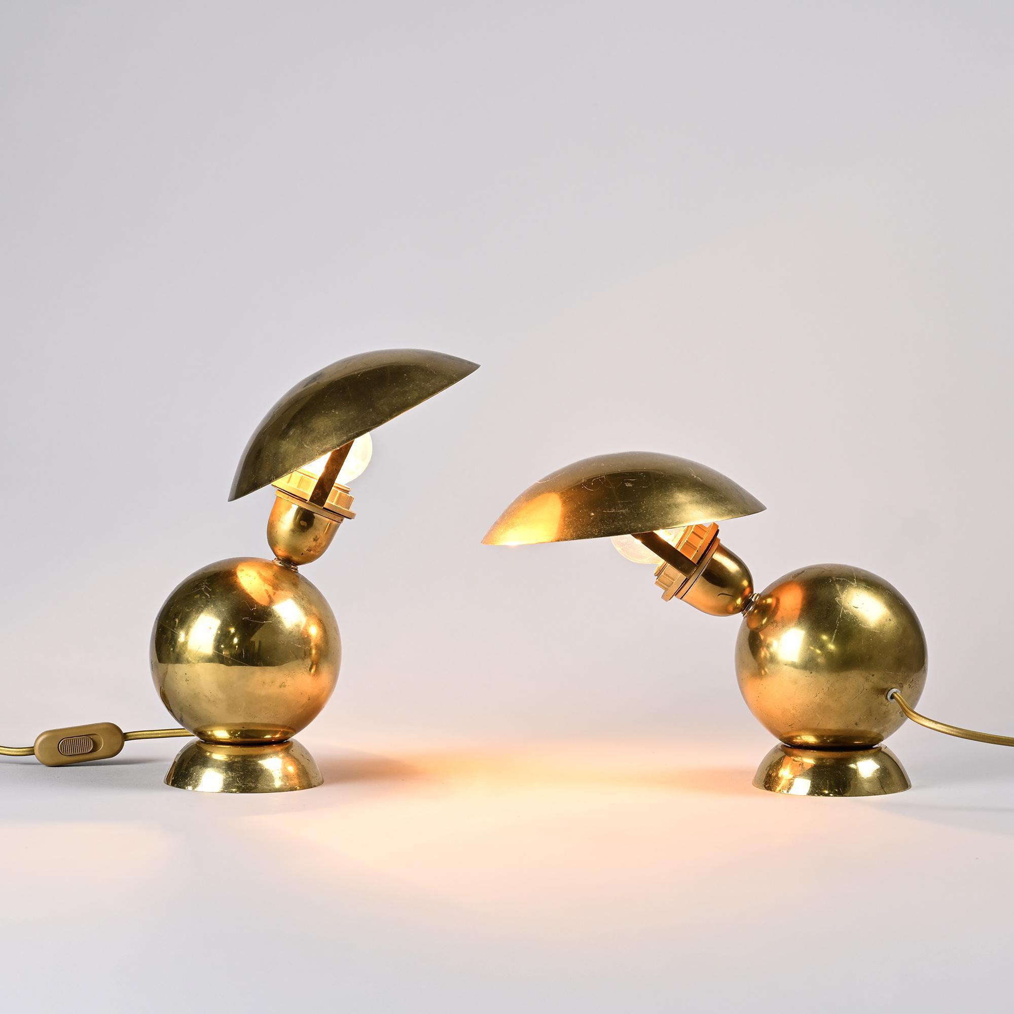 Pair of table lamps in gilded brass, created by Mathias, France, circa 1970.