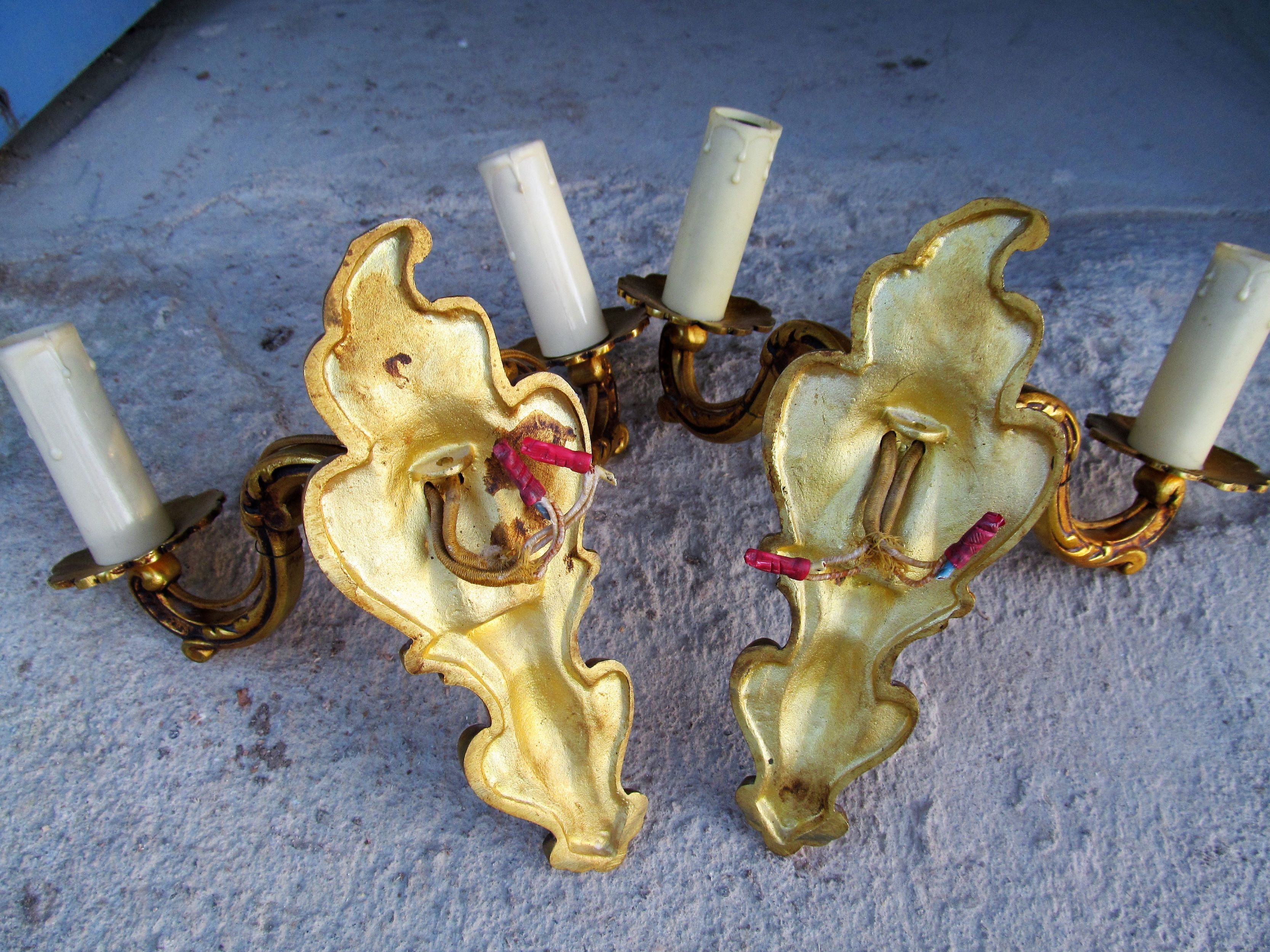 Louis XV style Bronze Brass twin arm wall lights