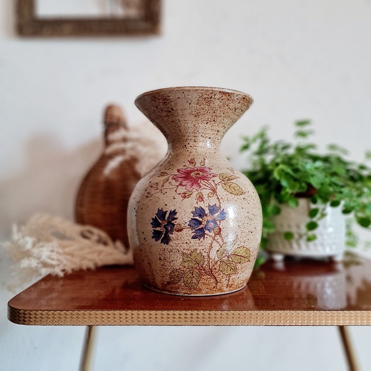 Old sandstone vase painted flowers
