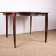Danish extendable dining table in Rio Rosewood model 55 by Arne Vodder for Sibast 1958.