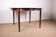 Danish extendable dining table in Rio Rosewood model 55 by Arne Vodder for Sibast 1958.