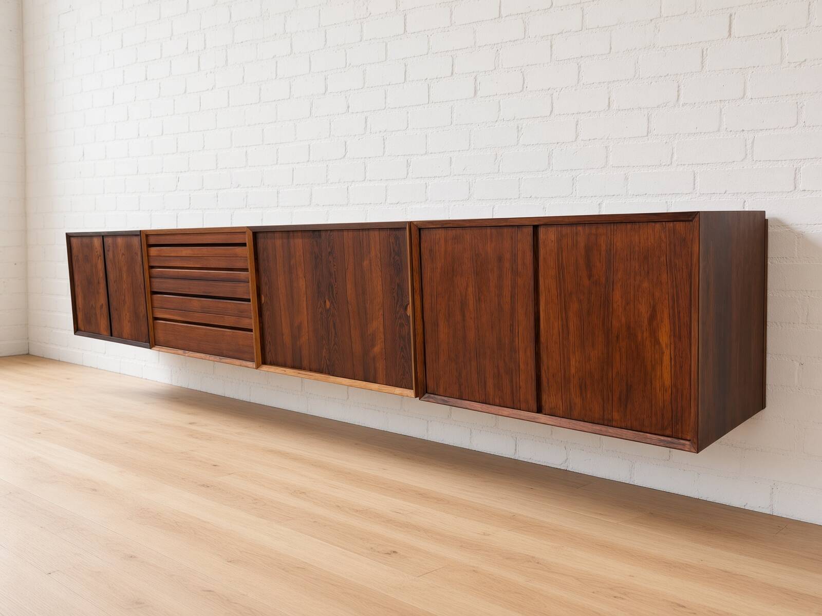 Buffet mural flottant en palissandre Poul Cadovius par CADO, années 1960.