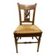 19th century straw chair with carved peacock back
