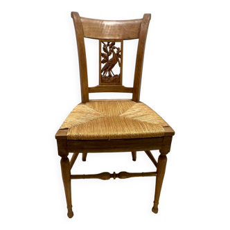 19th century straw chair with carved peacock back