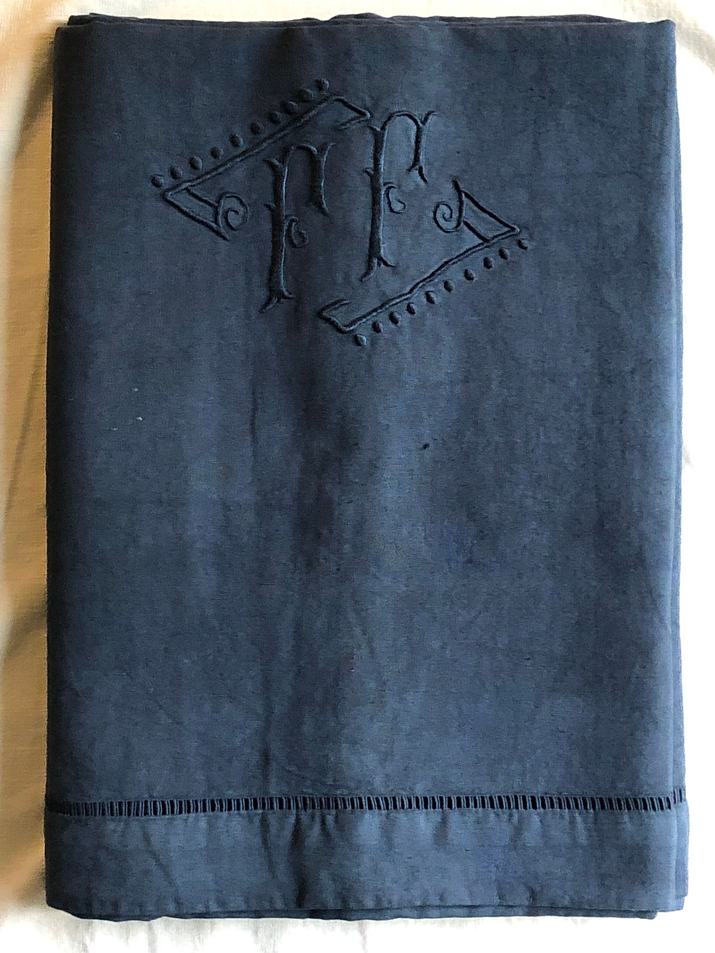 Old linen and cotton sheet dyed in night blue