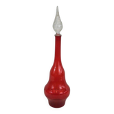 Large designer bottle in red glass