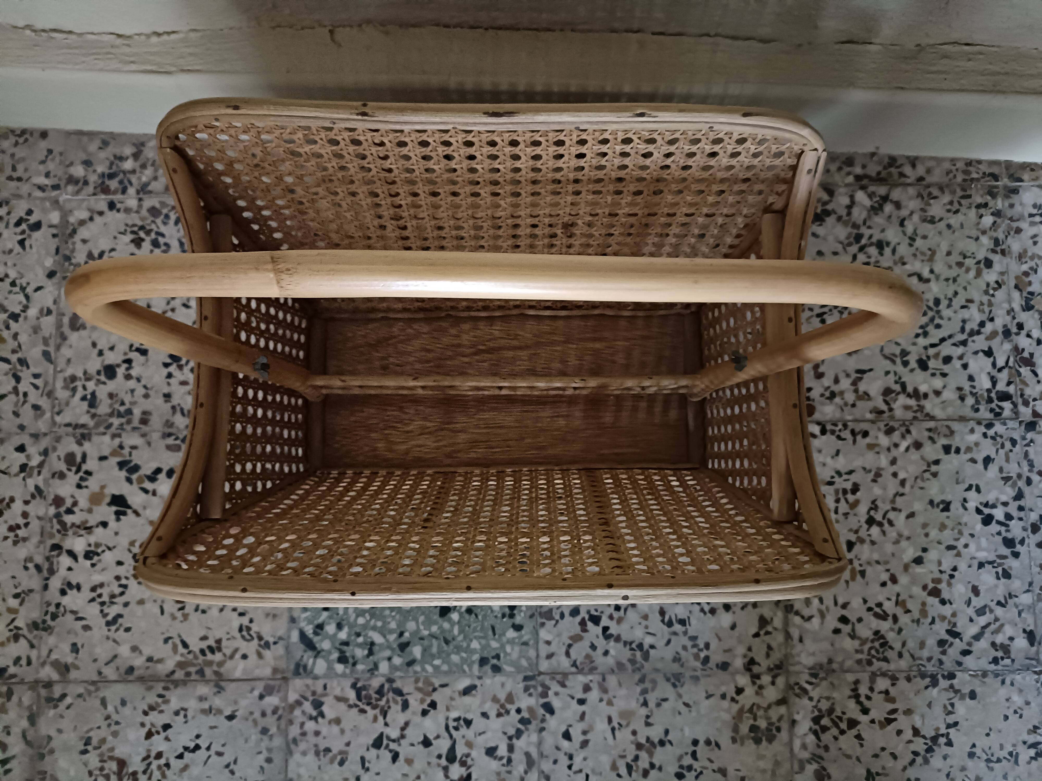 Caned magazine rack