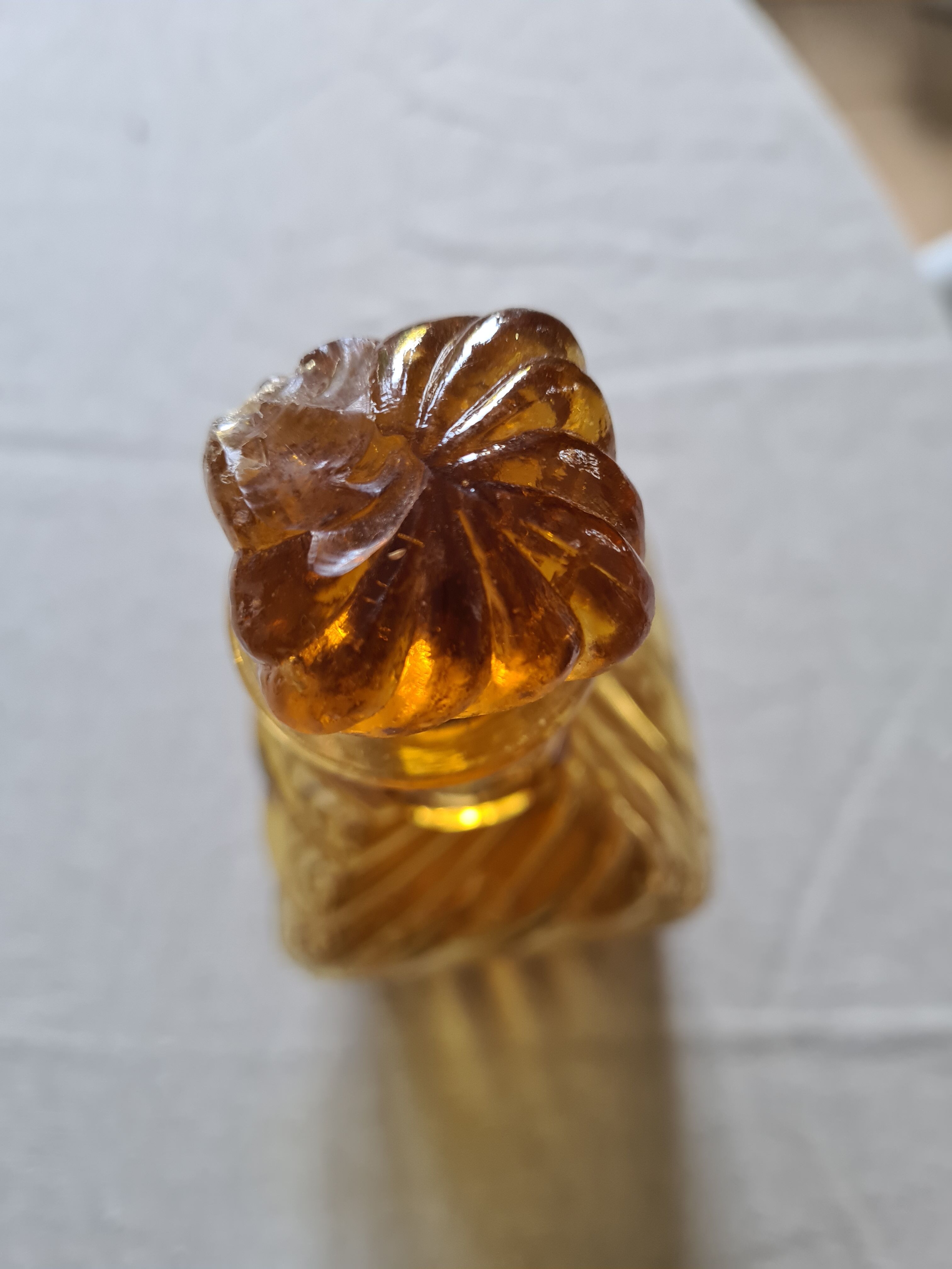 Antique decanter made of amber blown glass