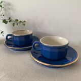 2 coffee cups and saucers