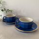 2 tasses à café et soucoupes