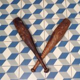 2 old wooden juggling clubs
