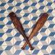 2 old wooden juggling clubs