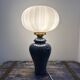 Geometric table lamp with pleated opaline shade