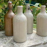 Four stoneware bottles