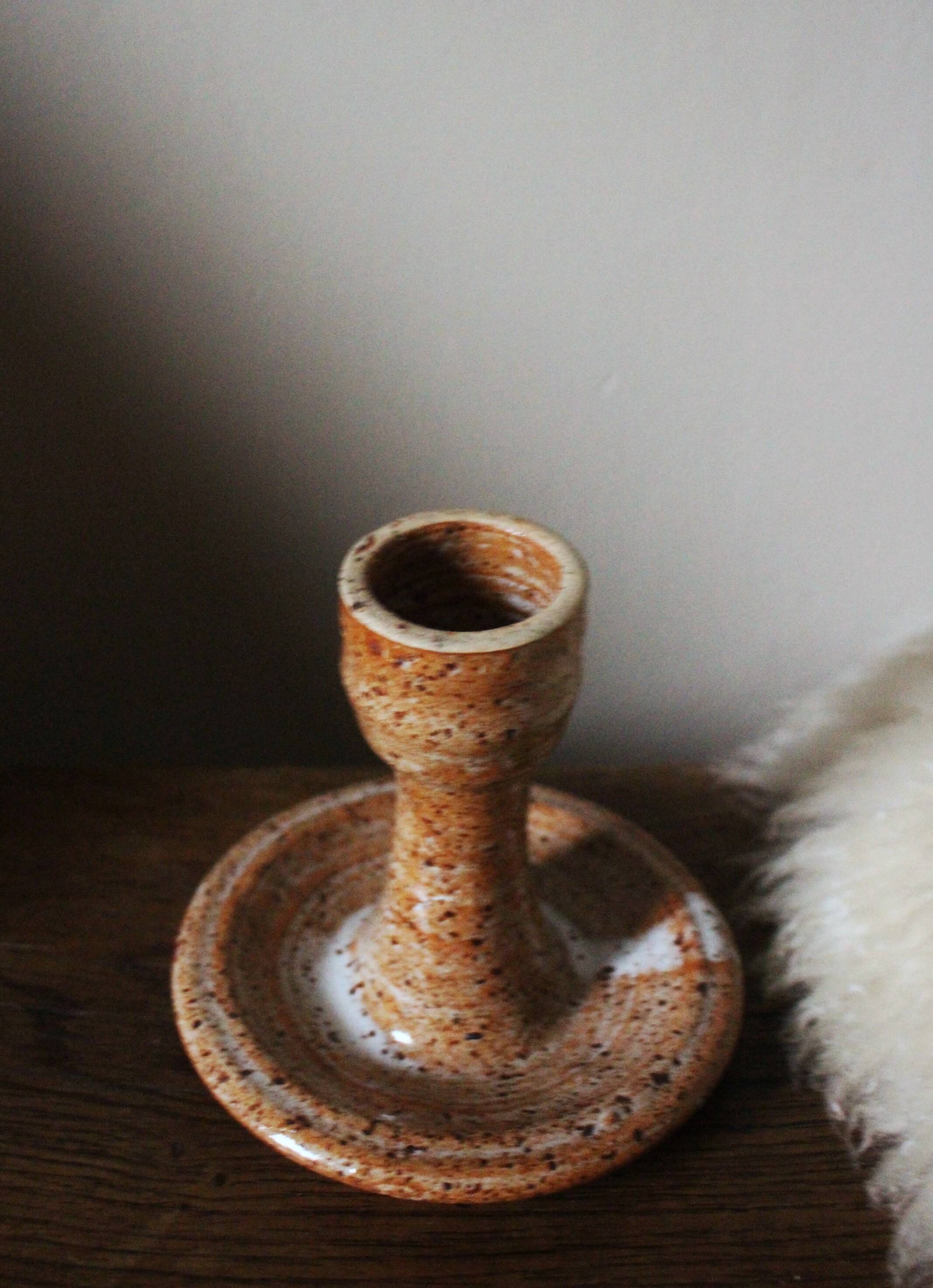 Vintage speckled rust round stoneware candlestick