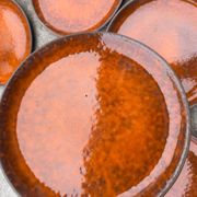 Assiettes céramique émaux orange années 70