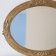 Oval mirror in gilded wood, antique, art deco 46x36cm