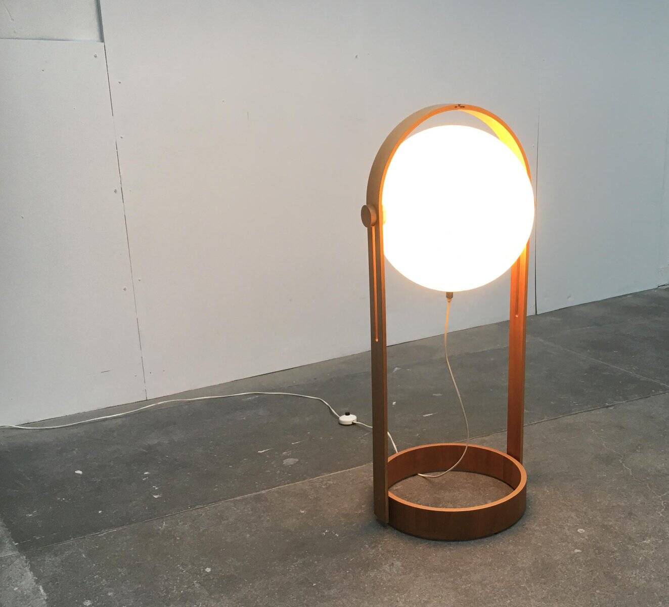 Swiss space-style floor lamp made of plastic and plywood from the 1960s.