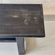 Antique black patinated wooden bench