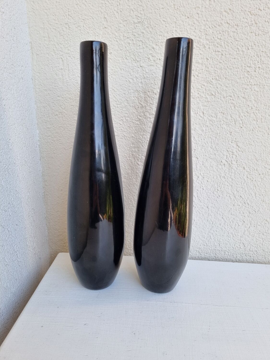 Black lacquered vases