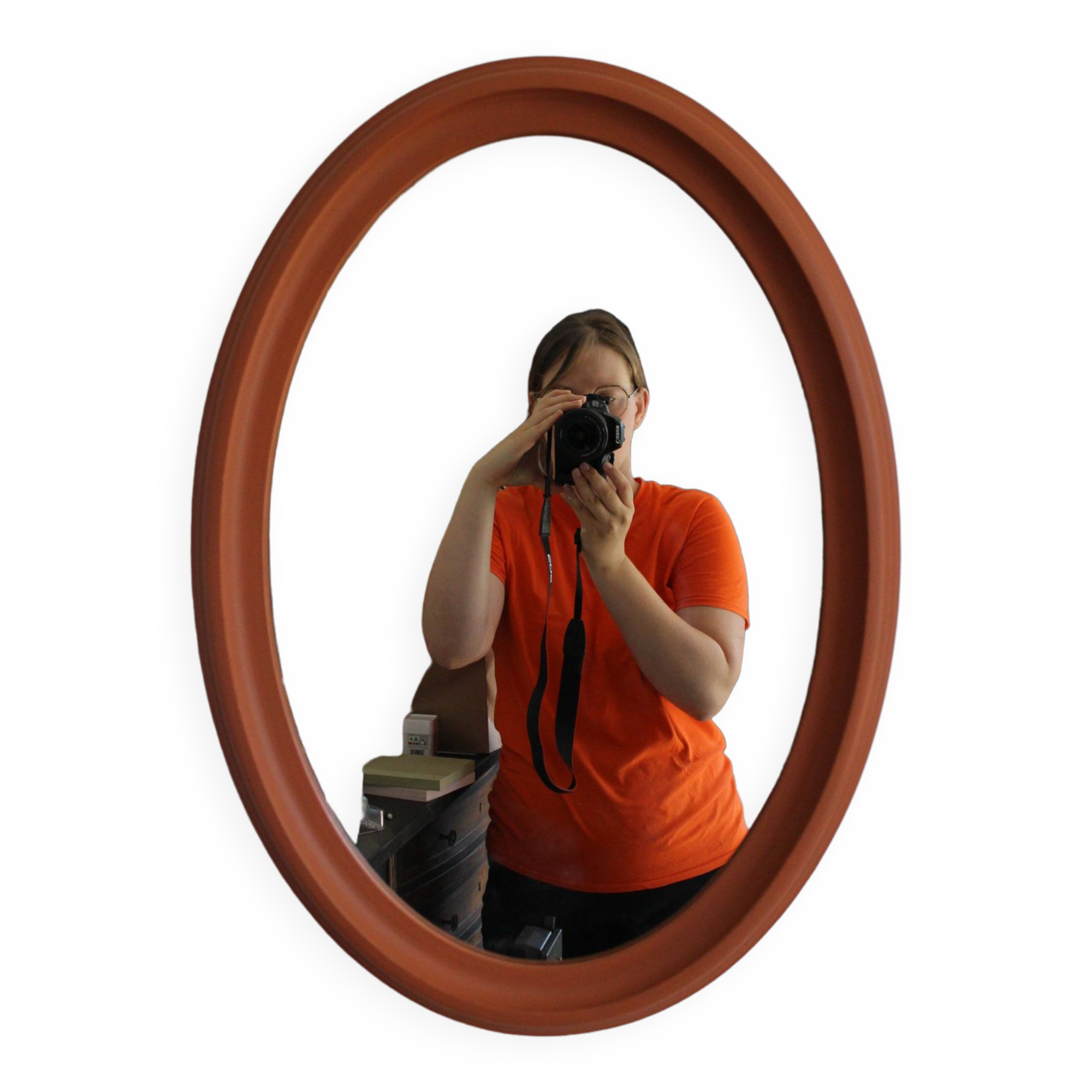 Terracotta patinated oval mirror