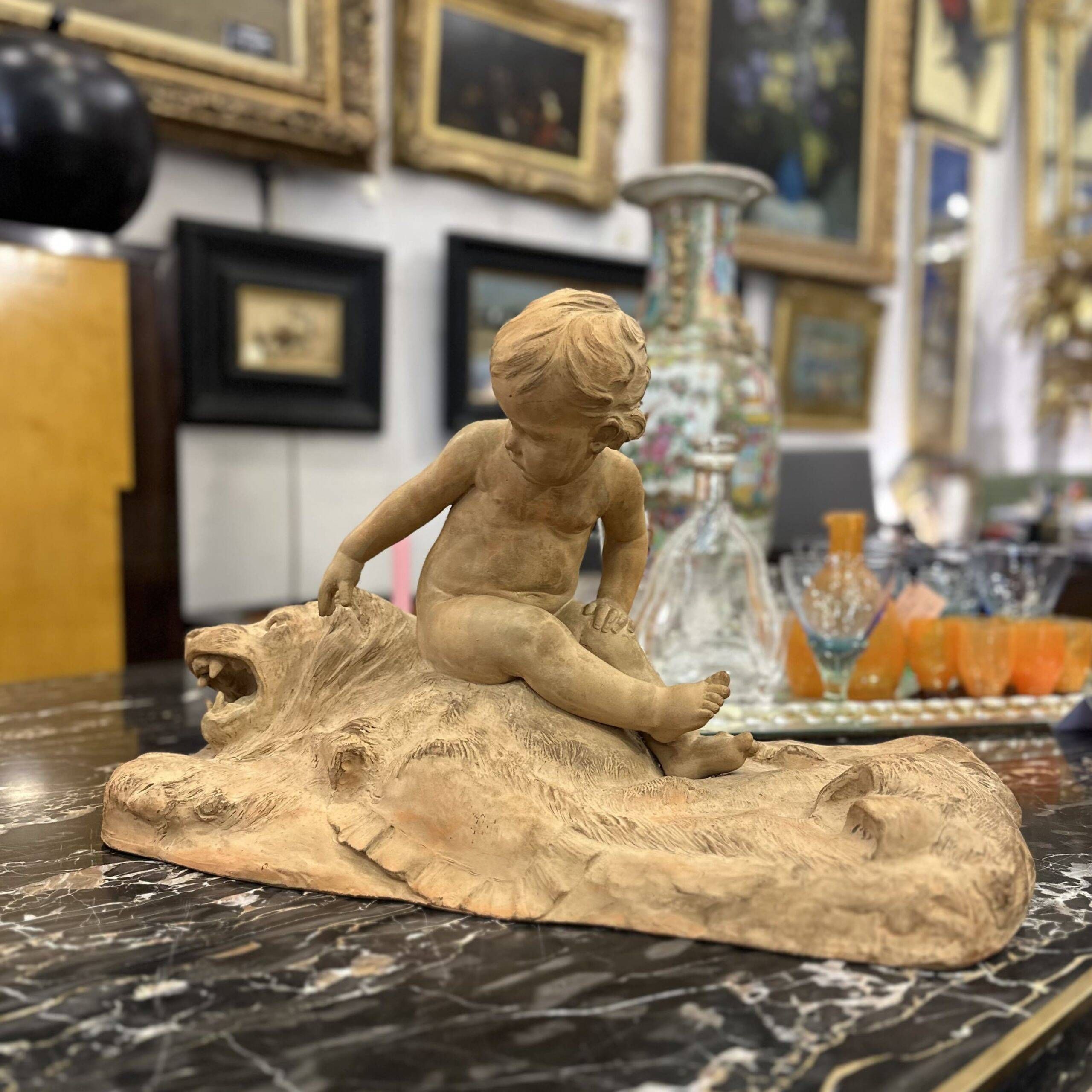 Sculpture "Putto on Lion Skin" in terracotta, Léon Dufrène, circa 1900 – France
