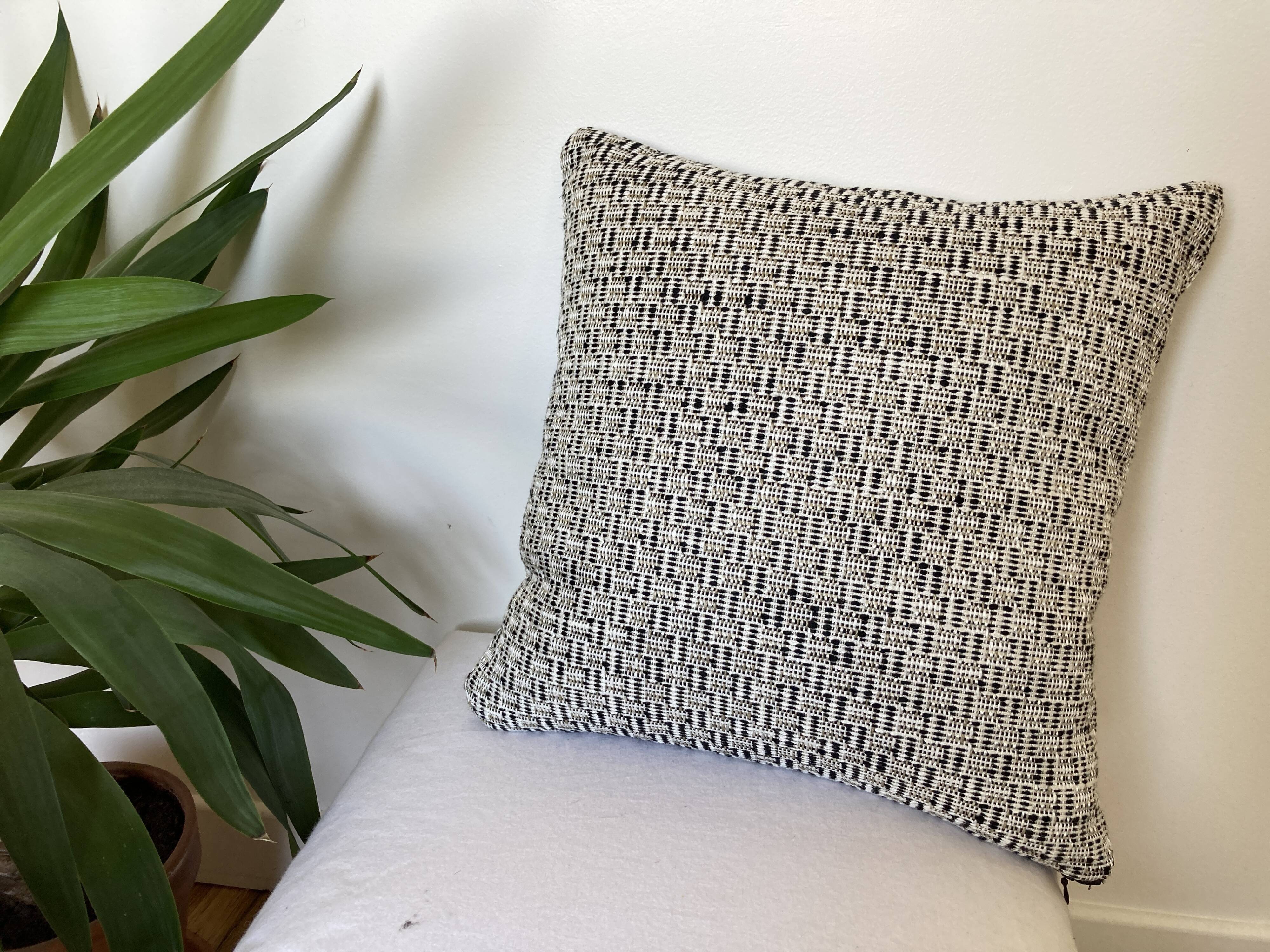 Black white beige cushion geometric patterns