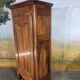 Small walnut bonnetière from the early 19th century.